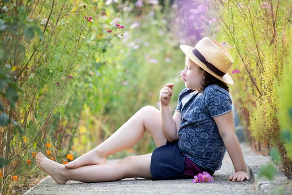 Little Adorable Girl Sitting Colorful Flower Garden Enjoying Autumn Sunlight — Stock Photo, Image