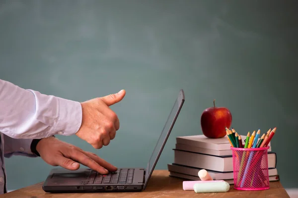 Back to School Concept. School math teacher giving virtual teaching remote class online lesson by zoom conference call on laptop computer.