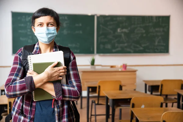 Smiling Student Girl Wearing School Backpack Mask Holding Exercise Book — Stock Photo, Image
