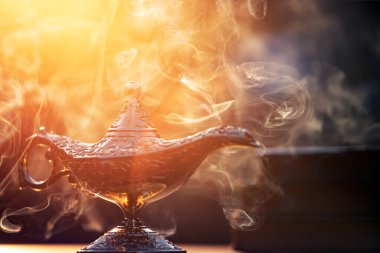 Müslümanlar için Ramazan Kareem tebrik kartı. İçinde Aladdin 'in dilek ve Kuran lambasının bulunduğu kutsal ay.