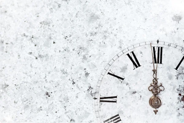 Old clock and holiday lights — Stock Photo, Image