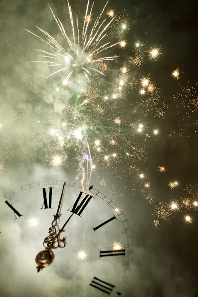 Old clock and holiday lights — Stock Photo, Image