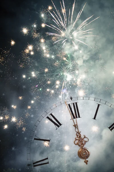 New Year's at midnight - Old clock and holiday lights — Stock Photo, Image