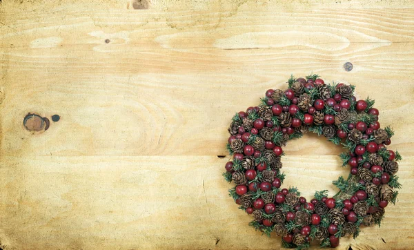 Weihnachtsdekoration auf hölzernem Hintergrund — Stockfoto