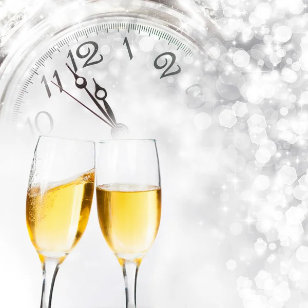 New Year's at midnight - Old clock and holiday lights — Stock Photo, Image