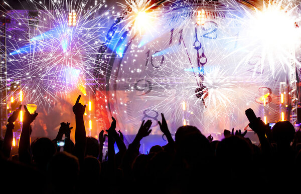 Clock and people waiting for New year