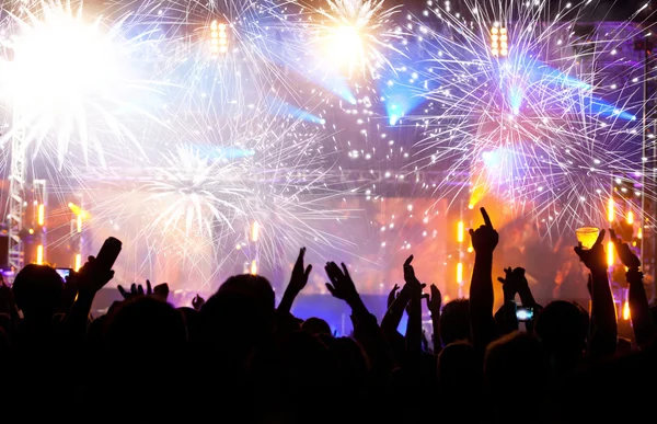 Celebrating New year with champagne and fireworks — Stock Photo, Image