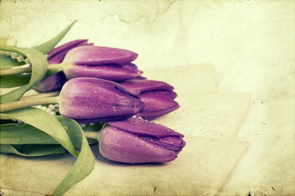 Love letters and purple tulips — Stock Photo, Image