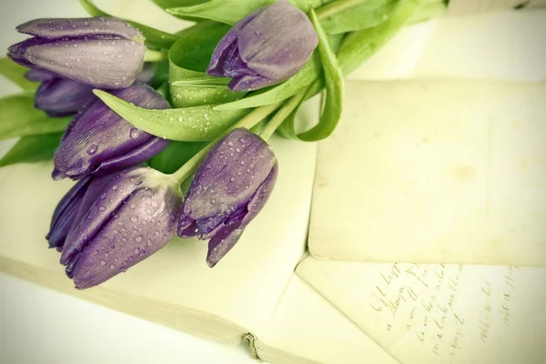 Love letters and purple tulips — Stock Photo, Image