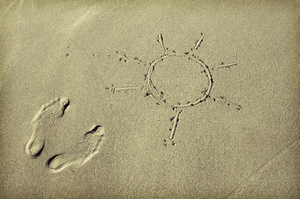 Voetstappen in het zand — Stockfoto