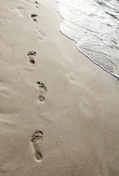 Footsteps in the sand — Stock Photo, Image