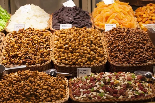 Nuts and almonds in the market — Stock Photo, Image