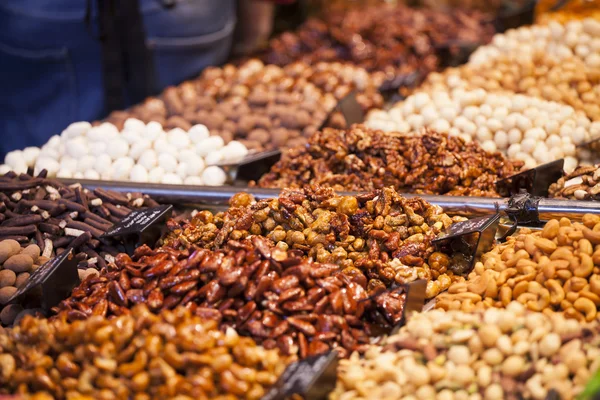 Nuts and almonds in the market — Stock Photo, Image