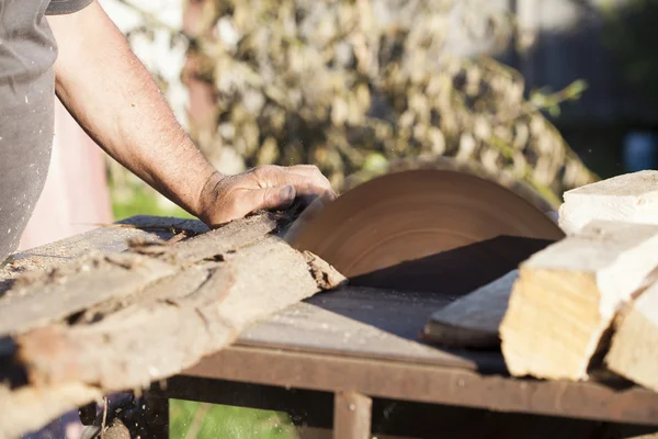 Carpenter working on woodworking machines — Stock Photo, Image