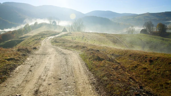 Curving road in the autumn landscape — Stock Photo, Image