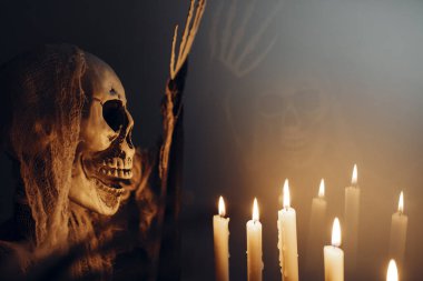 Creepy figure with and candle lights. Halloween festival concept.