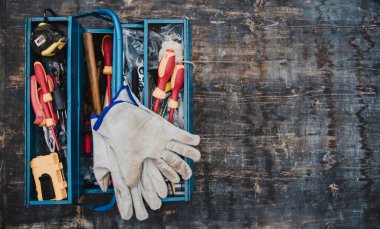 Portable tool box containing used equipment with copy space