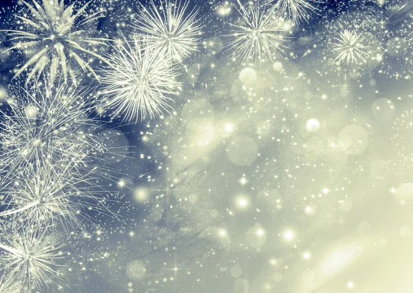 Abstrakter Urlaubshintergrund mit Feuerwerk und glitzernden Lichtern — Stockfoto