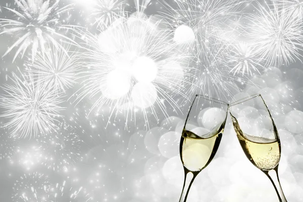 Champagne over fireworks and sparkling holiday lights — Stock Photo, Image