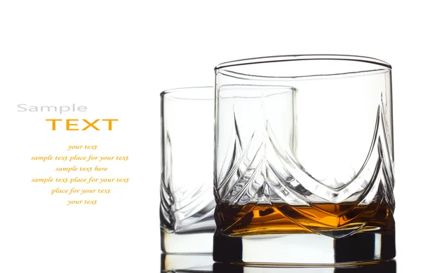 Glass of scotch whiskey isolated over white background and space for your own text — Stock Photo, Image