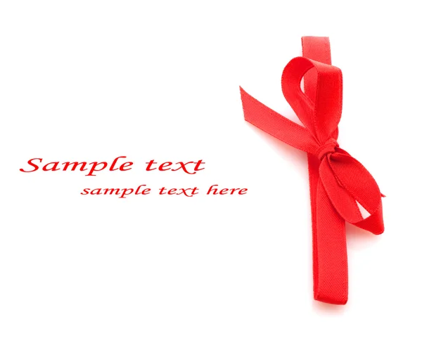 Red satin ribbon isolated over white background — Stock Photo, Image