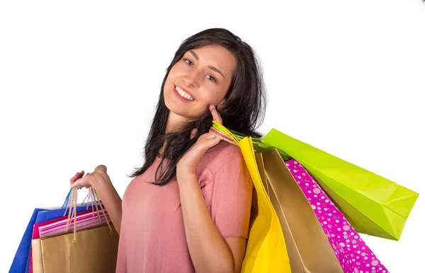 Mooie vrouw met een heleboel shopping tassen — Stockfoto