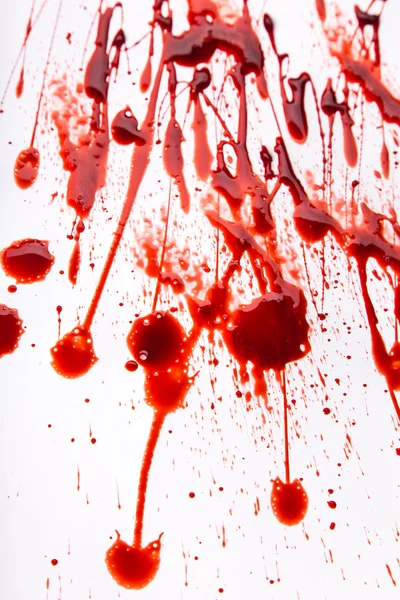 Macchie di sangue spruzzate su sfondo bianco — Foto Stock