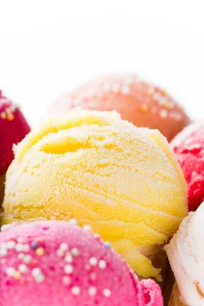 Ice cream scoops on wooden table. — Stock Photo, Image