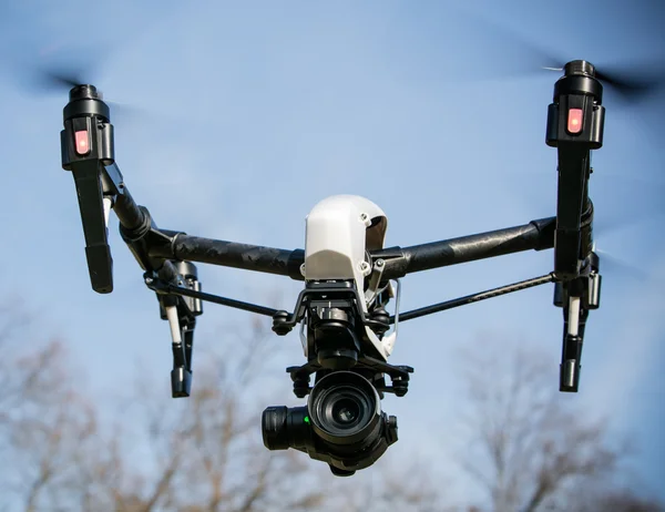 Drone with 4K camera flying. — Stock Photo, Image