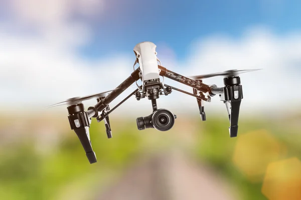 Drone with 4K camera flying. — Stock Photo, Image