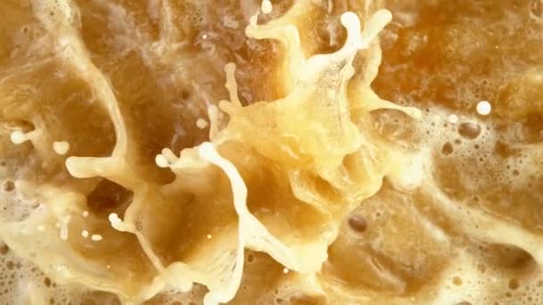 Macro Shot Of Beer Surface with Moving Foam — стокове відео