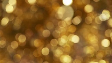 Soyut altın yıldız ışıkları parlak sanat arka planı, 4k, süper yavaş çekim.
