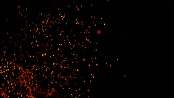 Super Slow Motion Shot of Fire Sparks elszigetelt fekete háttér — Stock videók