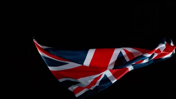 Detailní záběr na vlnění vlajky Velké Británie. GB Banner Flaping in Wind. Super pomalý pohyb. — Stock video