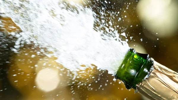 Champagne explosion with flying cork closure. — Stock Photo, Image