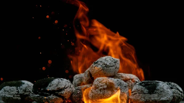 Charcoal briquettes ready for barbecue grill. — Stock Photo, Image