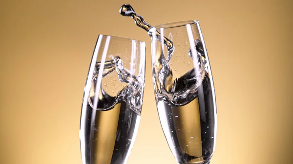 Two elegant champagne glasses making toast — Stock Photo, Image