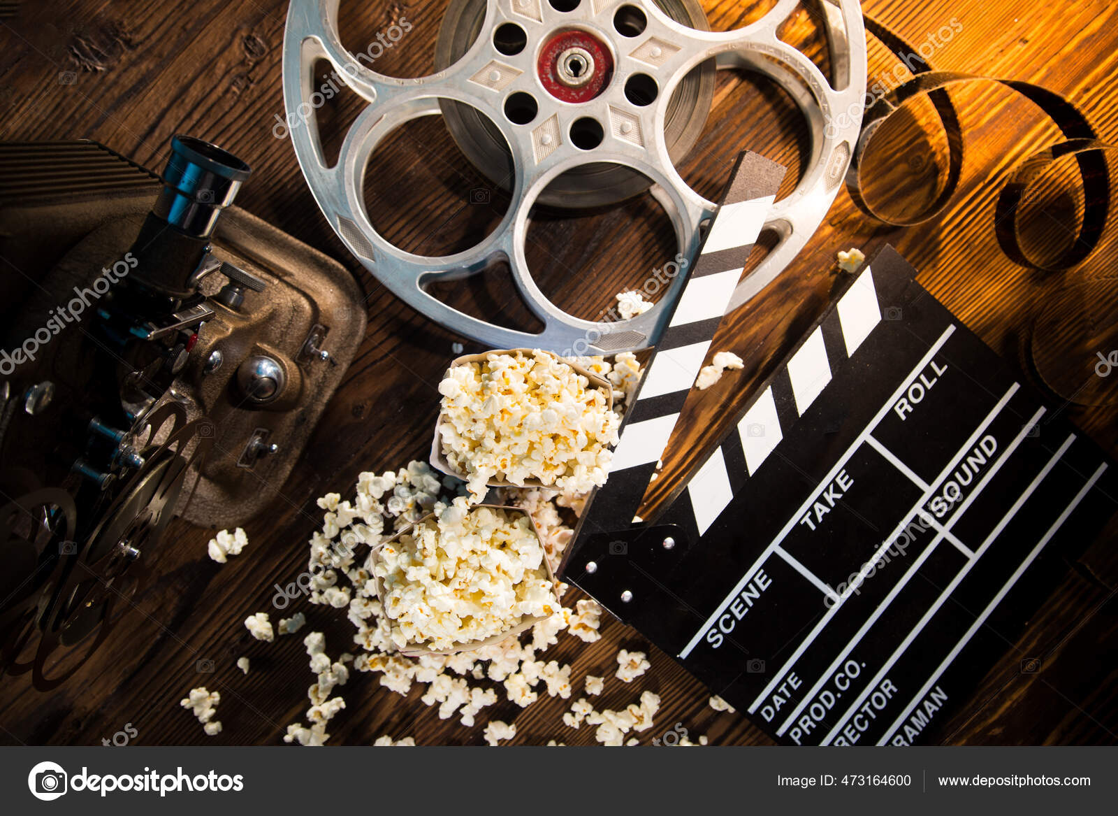 Cinema concept of vintage film reels, clapperboard and other tools — Stock  Photo © Kesu01 #473164600