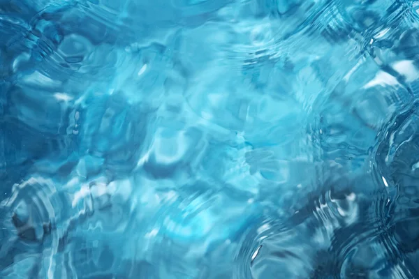 Fondo superficie blu dell'acqua, ripresa in studio — Foto Stock