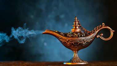 Antique Oriental Aladdin Arabian lamp with Soft Light Smoke. clipart