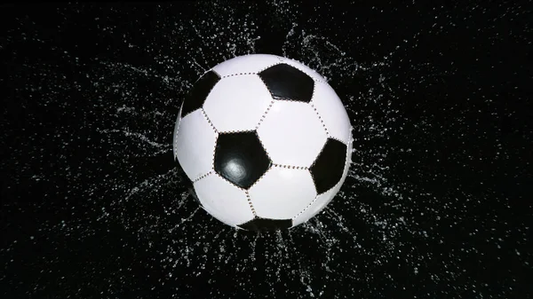 Close-up Foot Falling Soccer Ball into Water. — Stock Photo, Image