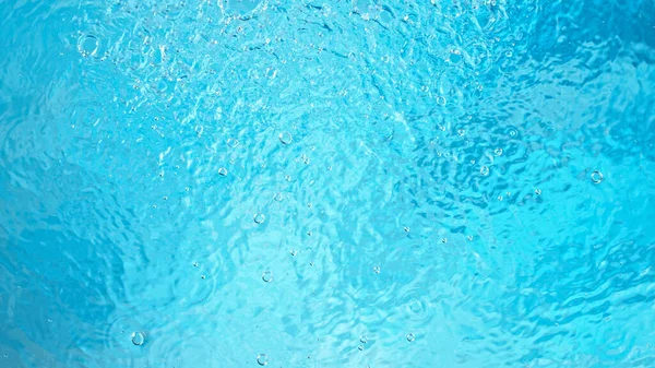 Fondo superficie blu dell'acqua, ripresa in studio — Foto Stock