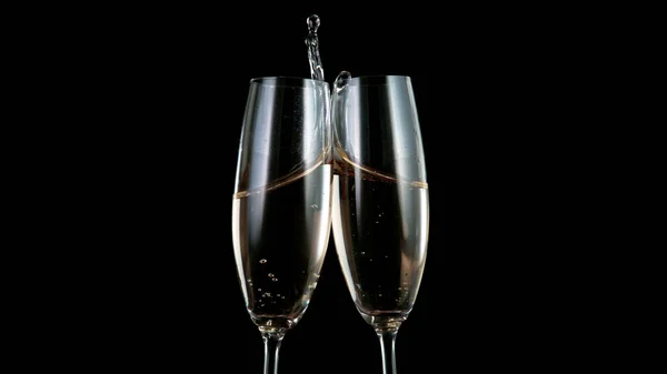 Freeze motion of toasting champagne flutes. — Stock Photo, Image