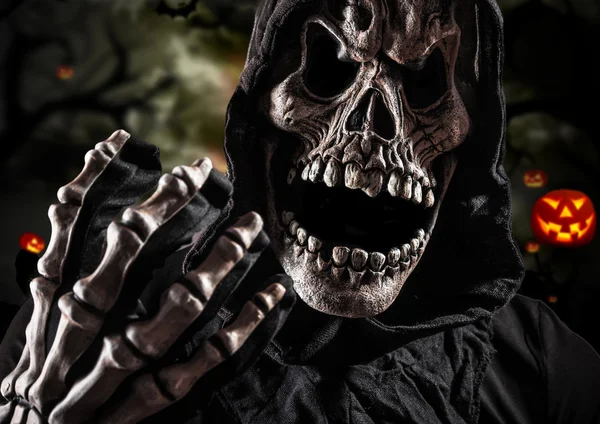 Grim reaper on a dark background — Stock Photo, Image