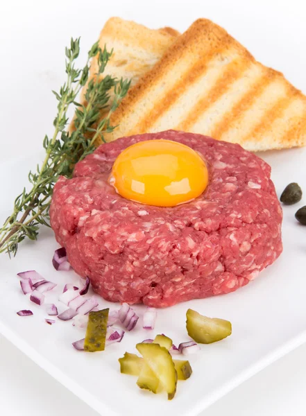 Fresh beef tartar with egg — Stock Photo, Image