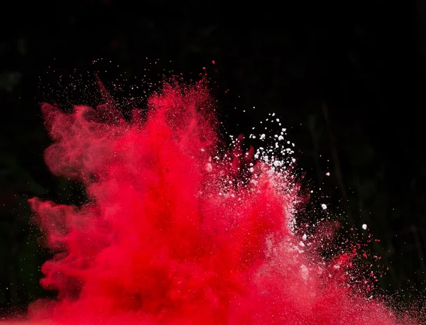 Lanciato polvere colorata su nero — Foto Stock