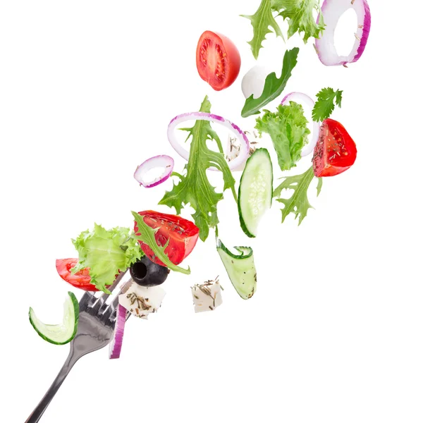 Ensalada fresca con vegetales voladores ingredientes — Foto de Stock