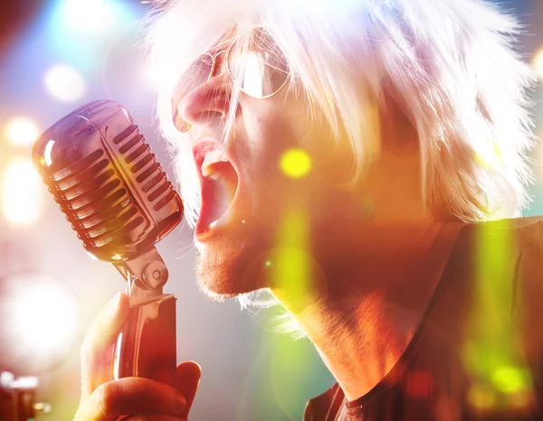 Rock singer with retro microphone — Stock Photo, Image