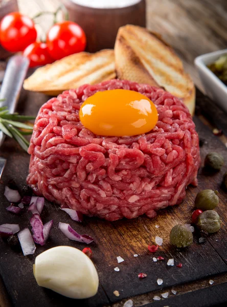 Fresh beef tartar with egg — Stock Photo, Image