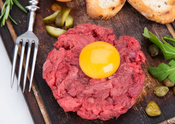 Fresh beef tartar with egg — Stock Photo, Image